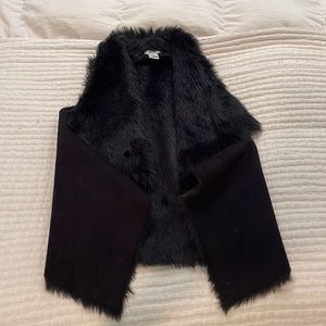 Black faux fur vest